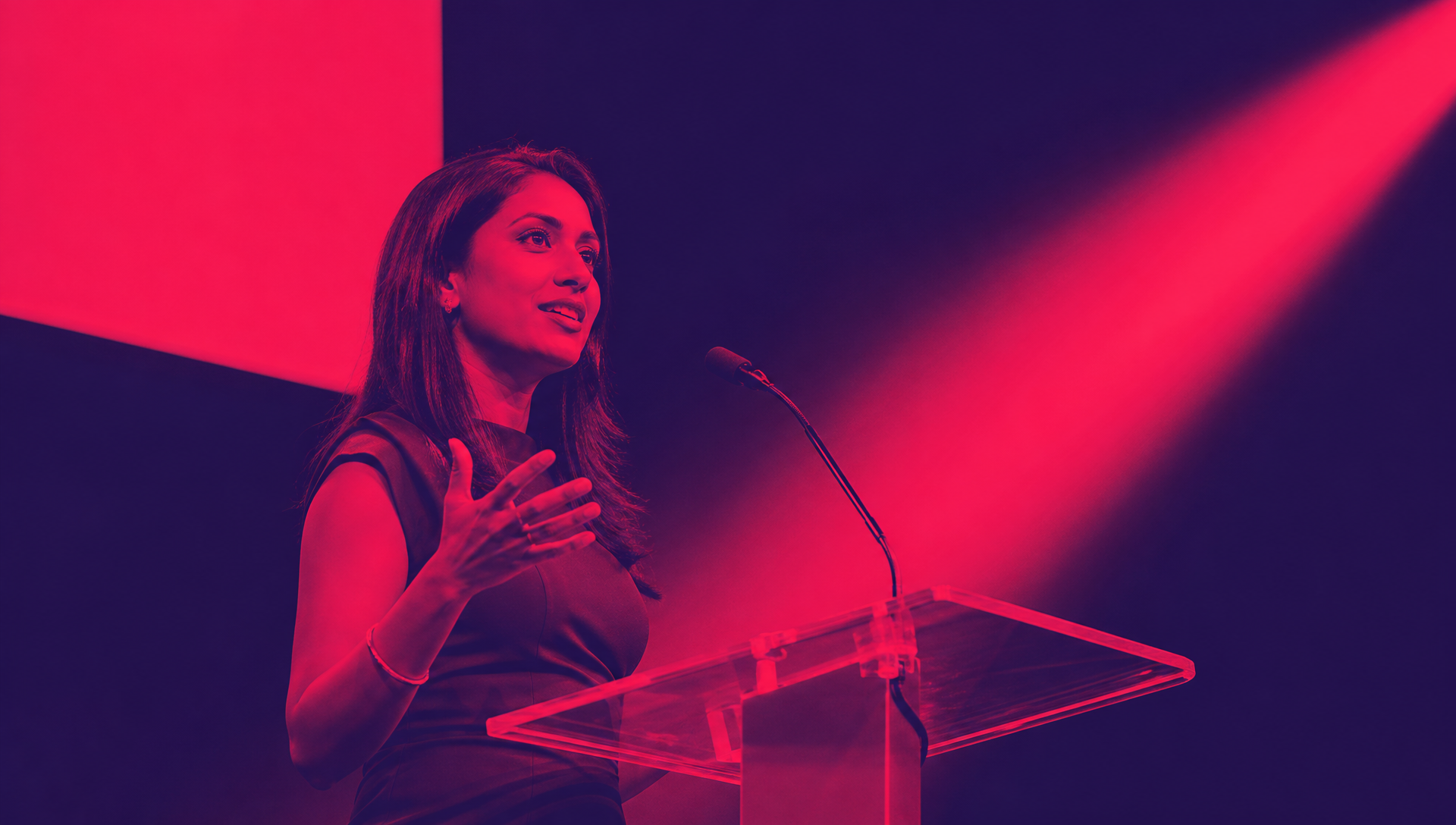 Corporate event management speaker commanding the room at a Chaos Theory event