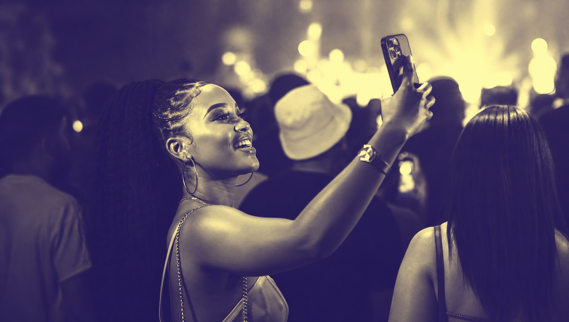Guest capturing a sponsorship activation moment on a phone