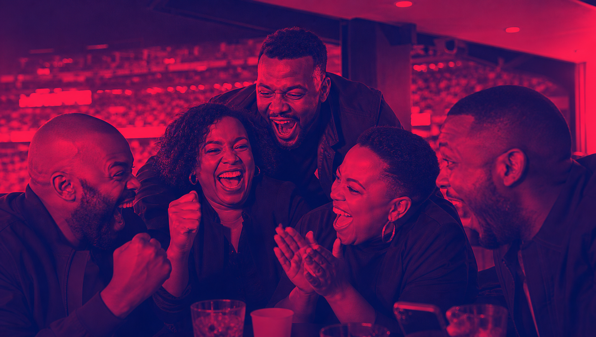 Premium event guests reacting together during live hospitality in Chaos Theory duotone